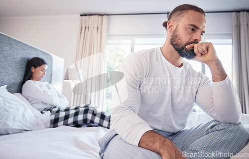 Image of Divorce, stress and couple on bed, argument and distance with breakup, affair and fighting. Man, woman and people with issues, marital problems in bedroom and depression with anxiety, ignore and sad