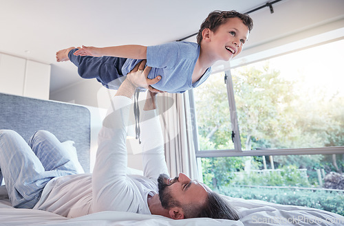 Image of Happy, airplane play and dad with child and happiness in a bedroom with trust and love. Happiness, father and young kid together in the air from flying game feeling excited with papa lift at home