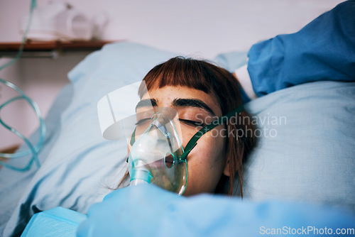 Image of Healthcare, anesthesia and woman with an oxygen mask, recovery and operation in hospital bed. Female, lady and patients with breathing equipment, coma and cardiology with emergency and ventilation