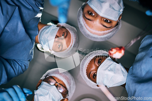 Image of Pov, surgery or doctors with mask, healthcare or treatment for injury, emergency or teamwork. Portrait, medical professional or staff with face cover, surgical or bottom view of coworkers in hospital