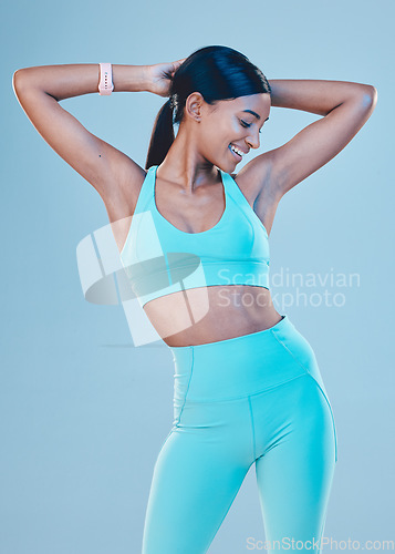 Image of Fitness, happy and woman in sportswear fashion feeling excited for exercise, workout or training isolated in a studio background. Health, wellness and female model or athlete ready with active style