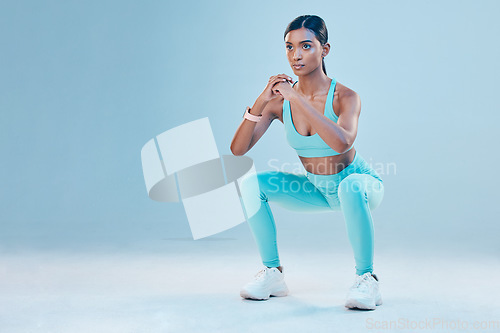 Image of Fitness, focus and mockup with a sports woman in studio on a gray background for health or wellness. Exercise, mindset and space with a young female athlete training for a healthy body or lifestyle