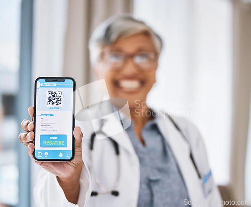 Image of Phone, screen and woman doctor with QR code, test results and drugs, virus or medical mobile app for health services. Website ux, online info and negative feedback with happy healthcare professional