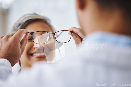 Image of Vision, optometry and woman with glasses, smile or prescription lenses with eye care. Female client, customer or optometrist helping lady, eyewear or clear eyesight in office and new frame spectacles