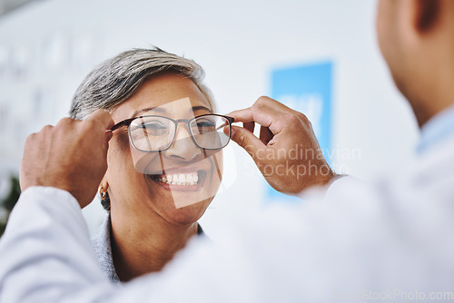 Image of Optometry, smile and woman with prescription glasses, optician and helping client with product. Female person, employee and optometrist assist with eyewear, clear vision and buying new spectacles