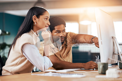 Image of Collaboration, computer and assistance with a business man helping a woman colleague in the office. Teamwork, help and advice with a female employee asking a male coworker to explain a work task