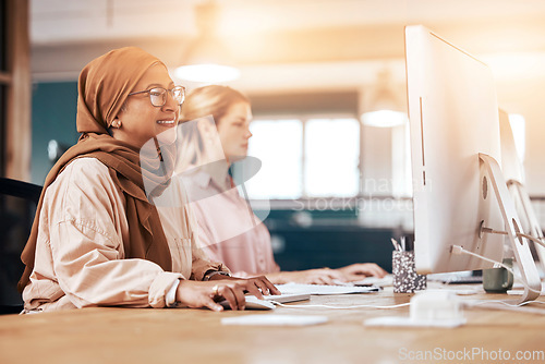 Image of Computer, office and happy muslim woman coworking, planning and online business or startup company. Diversity people, hijab employee or staff for digital research, technology review and desktop pc