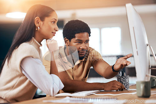 Image of Teamwork, computer and assistance with a business man helping a woman colleague in the office. Collaboration, help and advice with a female employee asking a male coworker to explain a work task