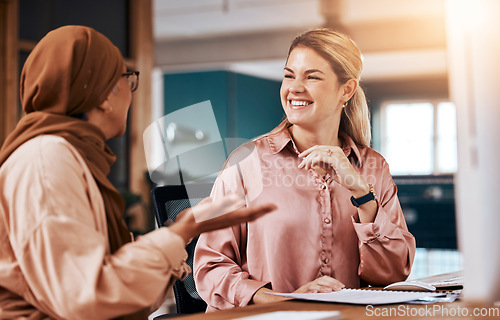 Image of Diversity, Islamic and business women talking or in conversation together planning in a company office. Happy, employees and friends in collaboration or Muslim colleague in discussion on a break