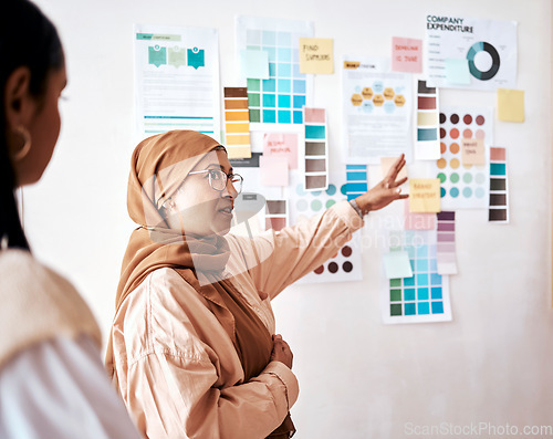 Image of Planning, teamwork and presentation with a business muslim woman talking to her team in the office. Creative, strategy and collaboration with a female manager teaching or coaching an employee group