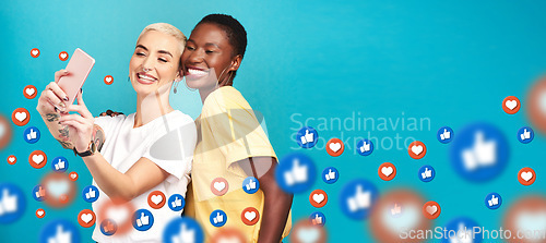 Image of Diversity, social media icons or friends take a selfie for content or online post on blue background. Love emojis, women or happy girls take pictures together on mobile app website or digital network