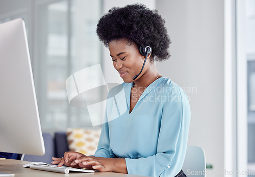 Image of Call center, consulting and typing with black woman at computer in office for networking, online or customer service. Happy, contact us and help desk with employee for technology, virtual or research