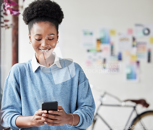 Image of Black woman, business and phone with a smile for communication, social media or online chat. Female entrepreneur person with a smartphone while typing on mobile app and happy about network connection