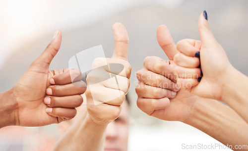 Image of Closeup of people, hands and thumbs up for teamwork, collaboration and agreement of solidarity together. Diversity, community and group with hand sign for thank you, trust and review with like emoji