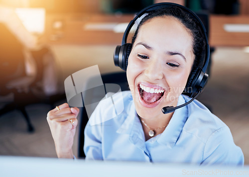 Image of Woman, call center and success fist in office for crm, promotion and customer service job. Consultant, happiness and winning in career, goals and achievement on voip for technical support on computer