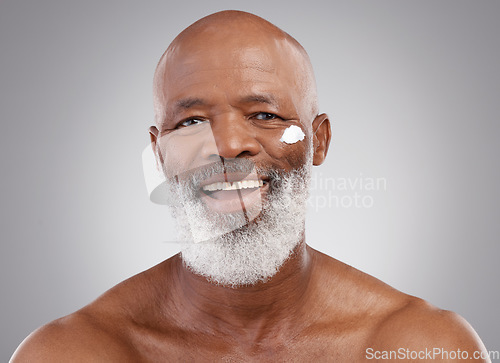 Image of Skincare, cream and portrait of senior black man in studio for wellness, cosmetics and facial creme. Dermatology, beauty and face of happy guy with anti aging lotion, wrinkle treatment or moisturizer