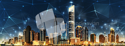 Image of Big data, network and cyber with city at night for connection, wireless and cloud computing. Technology abstract, communication and futuristic with skyline of urban town for internet, media and light