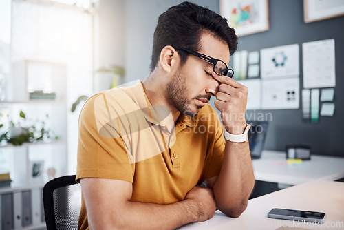 Image of Headache, burnout and tired business man with migraine, pain or stress from workplace pressure. Mental health, anatomy crisis or depressed person with medical emergency, depression or tension problem