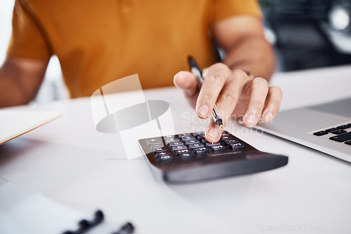 Image of Calculator, budget and man hands with finance, profit check and financial accounting on office desk closeup. Person or entrepreneur typing and calculating numbers in taxes, debt or business growth