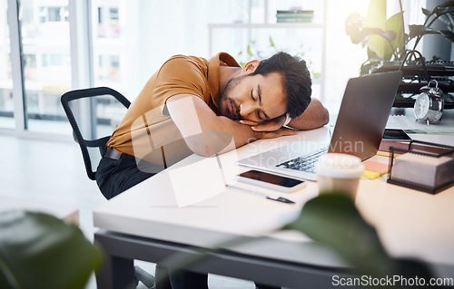 Image of Tired, business man and sleeping at desk in office with burnout risk, stress problem and nap for low energy. Fatigue, lazy and depressed male employee with anxiety, overworked and bored in workplace