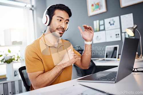 Image of Video call, laptop and man explain on webinar or virtual meeting for business planning in his office. Creative asian person with headphones on computer online discussion, speaking or client advice