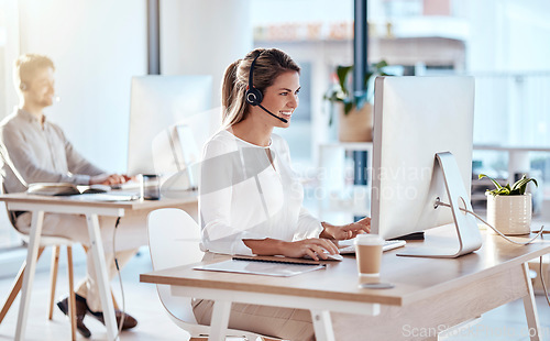 Image of Call center, computer and consulting with woman in office for customer service, technical support and advice. Technology, contact us and communication with happy employee operator in help desk agency