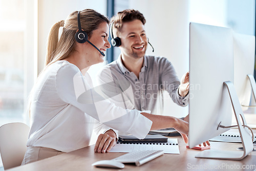 Image of Computer, collaboration and customer service with a consultant team working in a call center for support. Teamwork, crm or contact us with a man and woman employee at work in a consulting office
