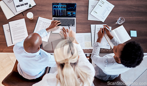 Image of Trading, teamwork or laptop for business people in office for stock market, investment or data. Growth, chart or finance top view of employee diversity and review for economy, documents and digital