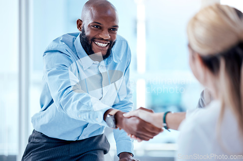 Image of Business people, smile and handshake for partnership, deal or collaboration. Welcome, happy and black man and woman shaking hands for agreement, b2b or congratulations, opportunity and onboarding.