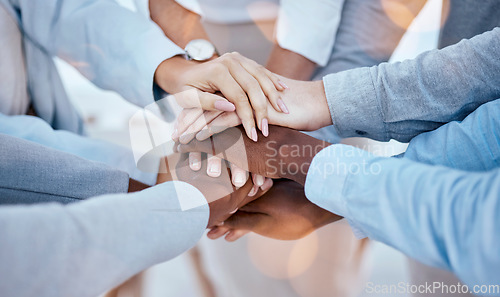 Image of Business people, hands or solidarity stack for collaboration, team building or trust. Teamwork, huddle or group of staff with men, women and hand together for community, unity and support motivation