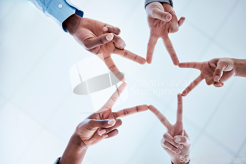 Image of Star, shape and hands of business people with peace, team building motivation and below support. Meeting, about us and employee fingers together for solidarity, mission or creative work goal