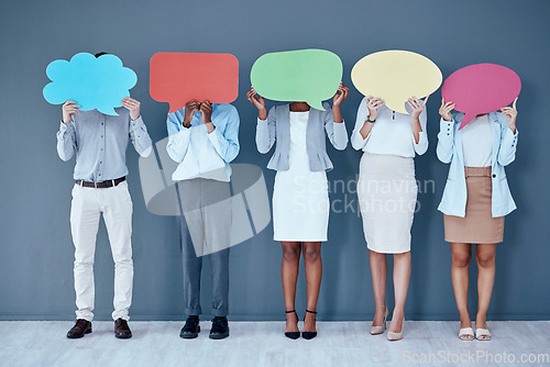 Image of Business people, speech bubble and hide face in office for social media, diversity or opinion by wall. Businessman, women and cloud poster for vote, recruitment or mockup with teamwork, idea or news