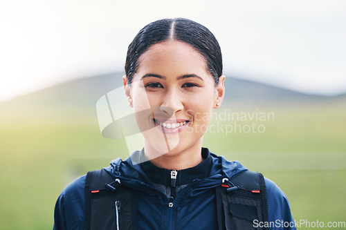 Image of Fitness, portrait and happy woman in nature for hiking, training and morning cardio on blurred background. Face, smile and female on a hike outdoors, excited and cheerful in a park or countryside