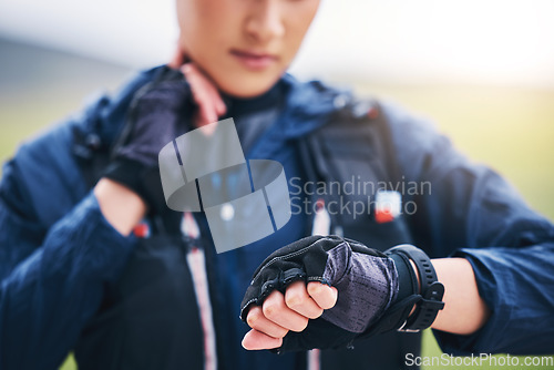 Image of Pulse check, smart watch and woman hands in the countryside ready for fitness and exercise. Sports, training and runner time of a female athlete looking at workout app for health and wellness