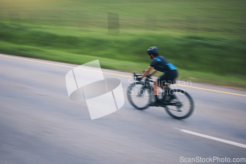 Image of Person, cycling and speed with motion blur outdoor on bike in countryside of training, triathlon and sports power. Athlete, bicycle and marathon race of fitness, energy and performance on mockup road