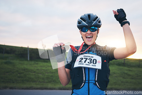 Image of Celebrate, sport and portrait of happy woman with medal for winning outdoor cycling race or triathlon. Happiness, win and cyclist with smile, fitness and excited celebration for gold winner at sunset