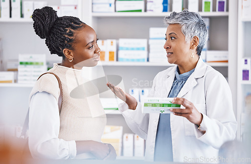 Image of Doctor, consulting and patient for healthcare prescription, medication or diagnosis for cure, illness or pain at pharmacy. Woman medical pharmacist talking to customer about pills or drugs at clinic