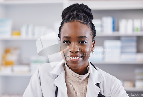 Image of Black woman, doctor and portrait smile in healthcare, pharmacy or medication consultant at clinic. Face of happy African American female medical professional or pharmacist smiling in health insurance