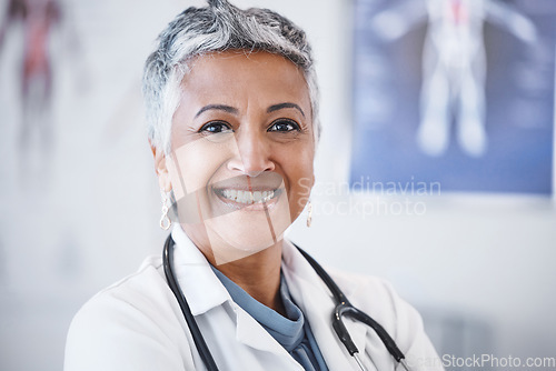 Image of Senior woman, doctor and portrait smile for healthcare, anatomy or cardiology at hospital. Face of happy elderly female medical professional smiling with teeth for health or life insurance at clinic