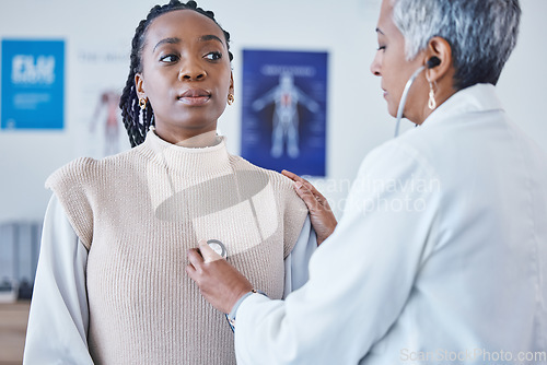 Image of Doctor, black woman and stethoscope on chest, breathe and test for lung healthcare and advice at clinic. Patient consulting medical professional, health care check and cardiovascular help at hospital