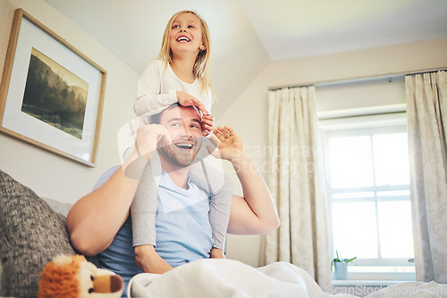 Image of Happiness, dad and child on bed playing, quality time for fun and games on weekend morning in family home. Smile, happy man and girl on shoulders, bonding in bedroom with love and laughing together.