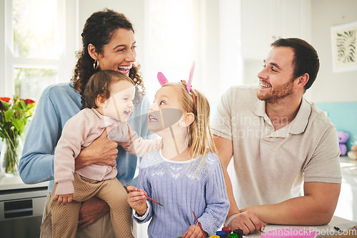 Image of Parents, girl children and bunny ears in family home with funny face, baby or happiness for easter. Man, woman and kids in house, laughing and excited for christian holiday with love, care or bonding