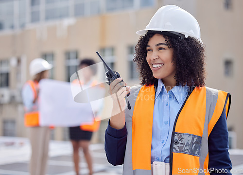 Image of Construction, woman with walkie talkie and communication, engineering and architect at work site. Inspection, technology and happy female contractor with radio, building industry and labor outdoor