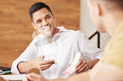 Image of Interior design, color swatch meeting and male architect in a company office for renovation project. Happy, smile and brand identity planning of a man employee speaking about creative branding work