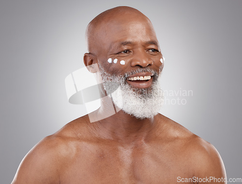 Image of Skincare cream, happy and face of old man for wellness, cosmetics and facial creme on studio background. Dermatology, beauty and black male guy thinking in anti aging lotion, wrinkles and moisturizer