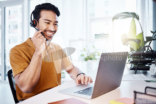 Image of Laptop, man and call center agent in the office doing research on a telemarketing crm strategy. Contact us, smile and male customer service consultant working on an online consultation with computer.