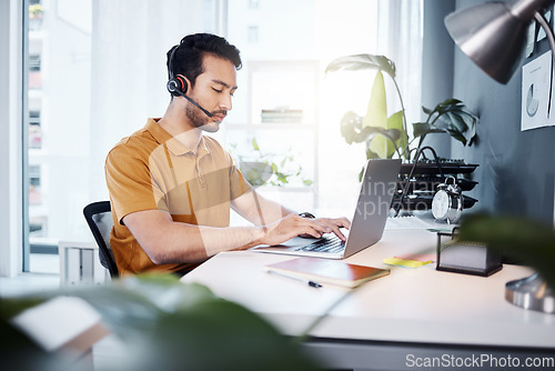 Image of Customer service laptop, office focus and man typing response for contact us, communication or ecommerce. Telemarketing sales pitch, e commerce or male callcenter consultant working on online support