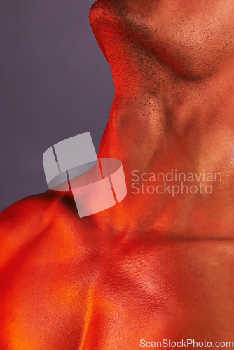 Image of Beauty, skincare and neck of man in studio for cosmetics, self care and grooming on purple background. Creative aesthetic, glow and closeup of male model for healthy skin, wellness and sensual pose