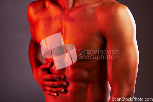 Image of Fitness, neon and abdomen of man in studio for healthy body, muscles and self care on purple background. Creative aesthetic, glow and stomach of strong male model for exercise, wellness and skincare