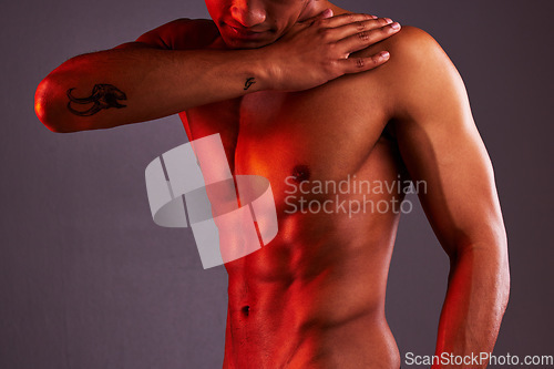 Image of Beauty, art and abs of man in studio for wellness, muscle and bodybuilder. Natural, creative and body with abdomen of male model isolated on gray background for six pack, sexy and neon mockup